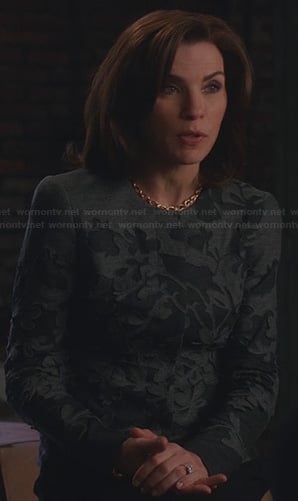 Alicia's grey and black laser cutout jacket on The Good Wife