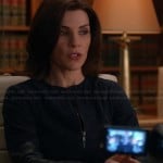 Alicia’s navy jacket with leather sleeves on The Good Wife