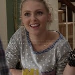 Carrie’s grey polka dot top with contrast pocket and trim on The Carrie Diaries