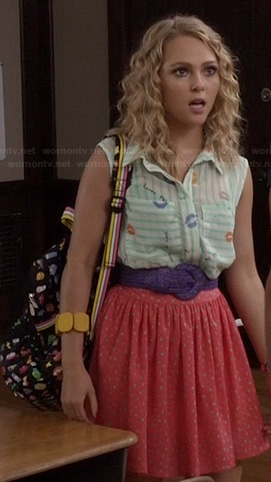 Carrie’s mint green striped top with kisses and purple belt on The Carrie Diaries