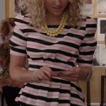 Carrie’s pink and black striped peplum top and green skirt on The Carrie Diaries