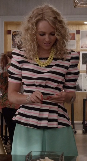Carrie's pink and black striped peplum top and green skirt on The Carrie Diaries