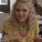 Carrie’s yellow people-printed blouse on The Carrie Diaries