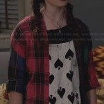 Dorrit’s 8 of spades tee and multicolored plaid shirt on The Carrie Diaries