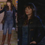 Jess’s denim overalls and navy blue toggle coat on New Girl