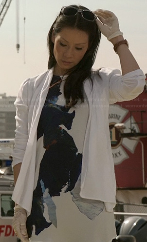 Joan's white abstract printed top on Elementary