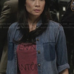 Joan’s “Vie En Noir Fantome” tshirt and denim shirt on Elementary