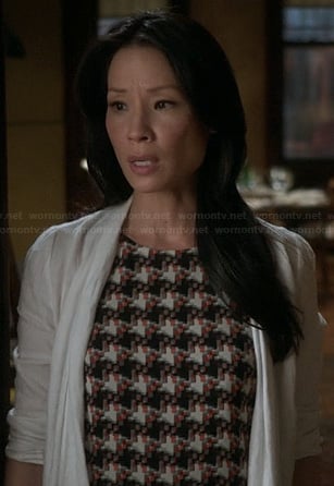 Joan's patterned top on Elementary