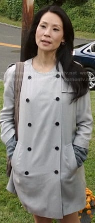 Joan’s beige double breasted collarless coat on Elementary