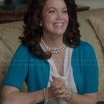 Mellie’s white pussy-bow blouse and blue short sleeve cardigan on Scandal