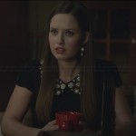 Olivia’s black top with embellished collar on Ravenswood