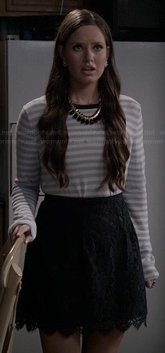 Olivia's striped sweater and black lace skirt on Ravenswood