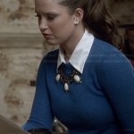 Olivia’s blue sweater with elbow patches on Ravenswood