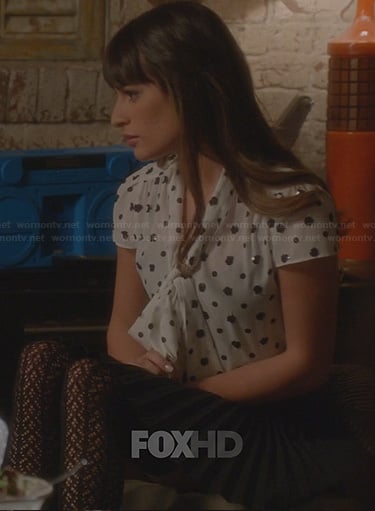 Rachel’s white blouse with black sequin spots and pleated skirt on Glee