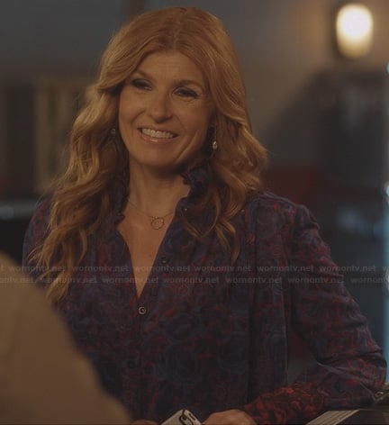 Rayna's purple and red floral printed blouse with red ruffle collar on Nashville