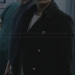 Remy’s black jacket with gold buttons on Ravenswood