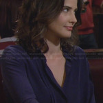 Robin’s blue pleated blouse with black collar on How I Met Your Mother