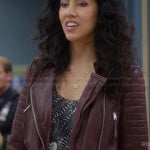 Rosa’s black feather print top and burgundy leather jacket on Brooklyn Nine Nine