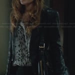 Abby’s white leopard print blouse and leather peplum jacket on Scandal