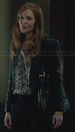 Abby's white leopard print blouse and leather peplum jacket on Scandal