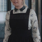 Kelsi’s (Ashley Tisdale) deer print top with leather collar and pinafore dress on The Crazy Ones