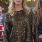 Kelsi’s (Ashley Tisdale) gold sweater on The Crazy Ones