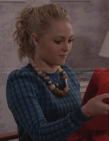 Carrie’s blue printed sweater and bead necklace on The Carrie Diaries