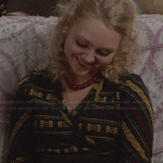 Carrie’s green and yellow wrap around sweater on The Carrie Diaries