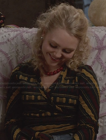 Carrie’s green and yellow wrap around sweater on The Carrie Diaries