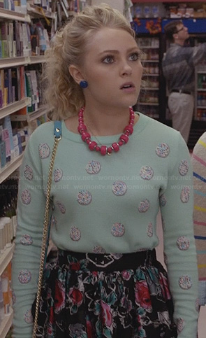 Carrie's mint green polka dot sweater and black floral skirt on The Carrie Diaries