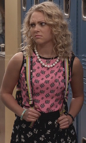 Carrie’s pink printed top and black lightning bolt print skirt on The Carrie Diaries