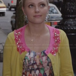 Carrie’s shoe print dress and yellow and pink embellished cardigan on The Carrie Diaries