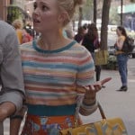 Carrie’s striped cropped sweater, orange floral shorts and yellow bag on The Carrie Diaries