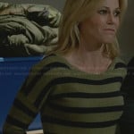 Claire’s green striped sweater on Modern Family