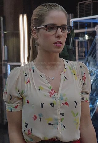 Felicity's white paint print blouse on Arrow