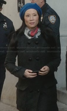 Joan's grey pea coat and blue beret on Elementary