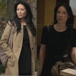 Joan’s black leather trimmed dress and long tan coat on Elementary