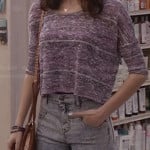 Maggie’s purple crop top and high waisted acid wash jeans on The Carrie Diaries