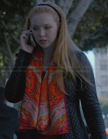 Alexis's black quilted coat and orange paisley scarf on Castle