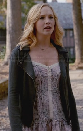 Caroline's floral ruffled top and grey moto jacket on The Vampire Diaries