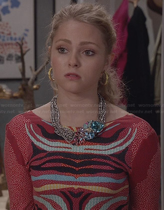 Carrie’s red tiger striped long sleeved dress on The Carrie Diaries