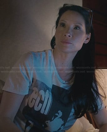 Joan’s “ecti” graphic tee on Elementary