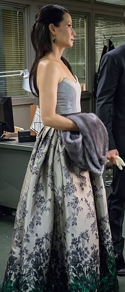 Joan’s silver and green floral ombre gown on Elementary