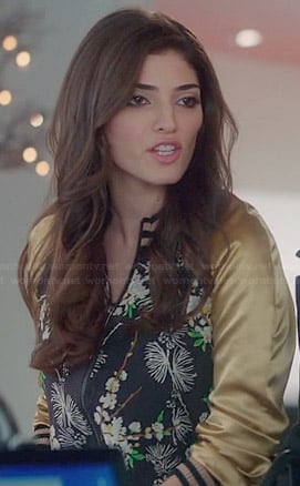 Lauren's floral bomber jacket with gold sleeves on The Crazy Ones