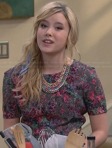 Lennox’s grey floral peplum top on Melissa and Joey