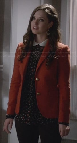 Olivia's rust orange blazer and floral collared blouse on Ravenswood