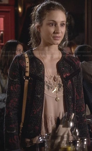 Spencer’s peach lace top and black and red jacket on Pretty Little Liars
