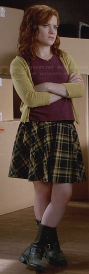 Tessa's plaid skirt with yellow cardigan and calf boots on Suburgatory