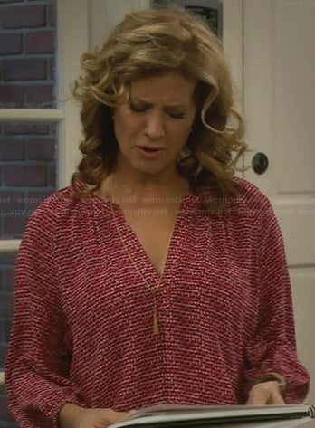 Vanessa’s red printed blouse on Last Man Standing