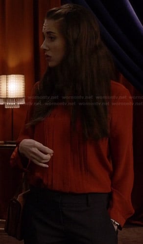 Annie’s orange pleated front blouse on Community